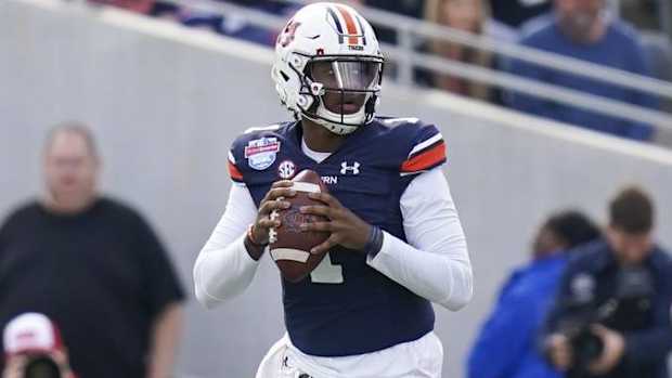 Auburn quarterback T.J. Finley drops back to pass in the Birmingham Bowl vs. Houston.